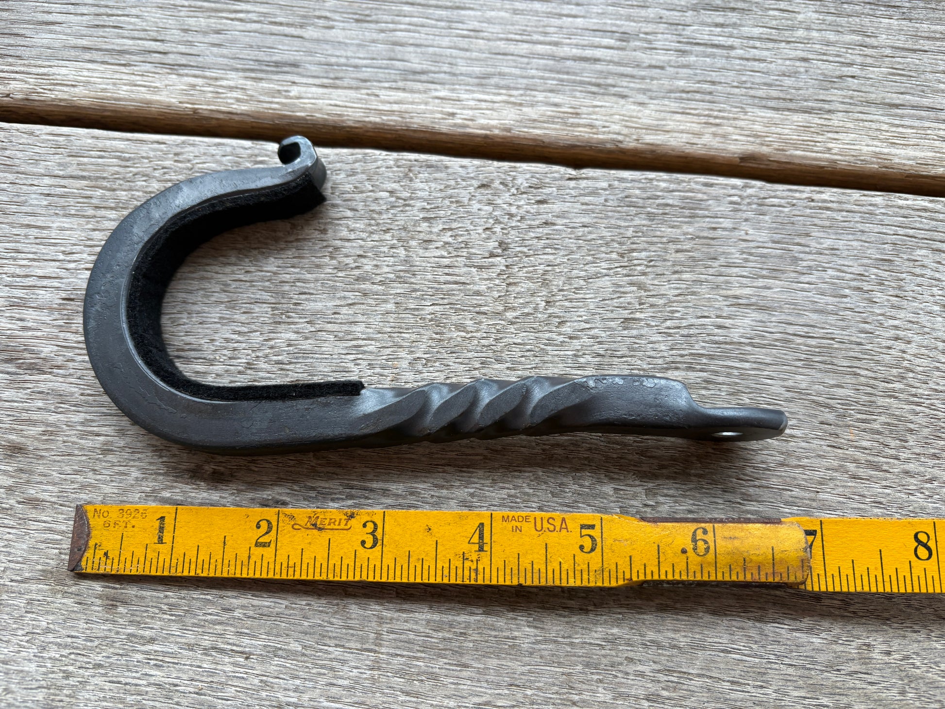Hand forged iron gun hooks are 7 inches long